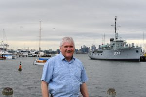 Peter Hemphill in front of boats in Williamstown 